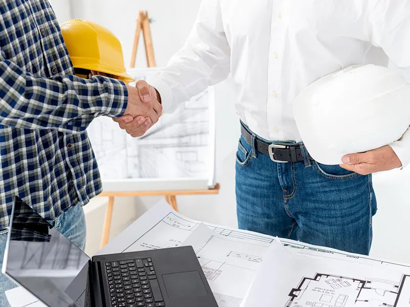 Commercial Insulation Services in New York - An Architect and a Business Owner Shaking Hands