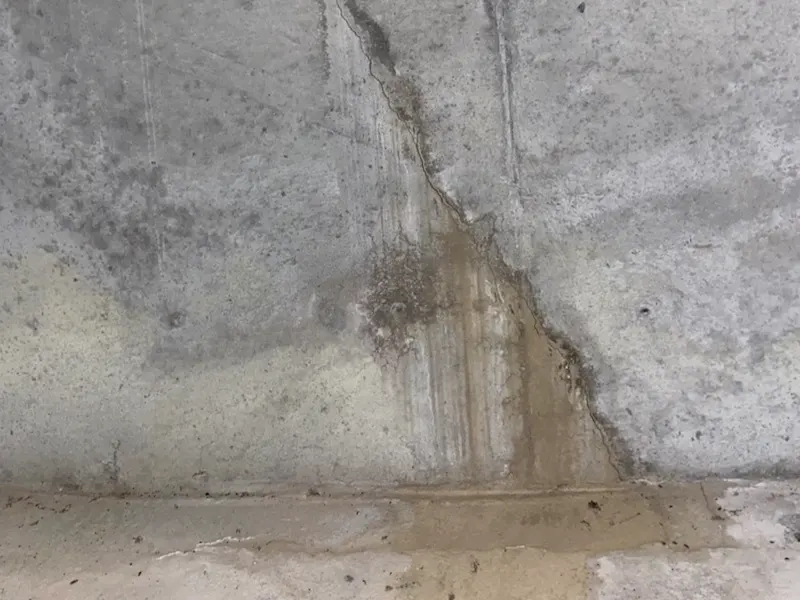 Underpinning Contractors in New York - A Picture of a Vertical Wall Crack in a Basement Wall