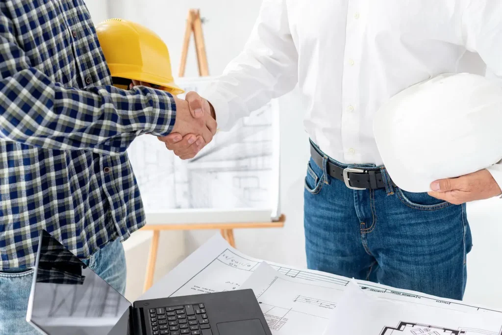 Commercial Waterproofing Services in New York - A Contractor and a Business Owner Shaking Hands